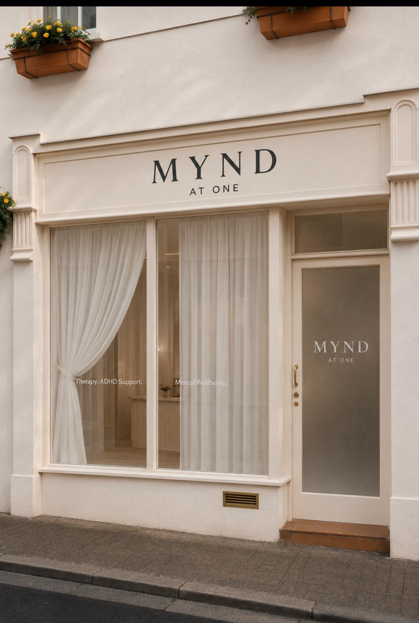 The MYND AT ONE storefront on La Plaiderie, St Peter Port, painted cream with the MYND signage above the window.