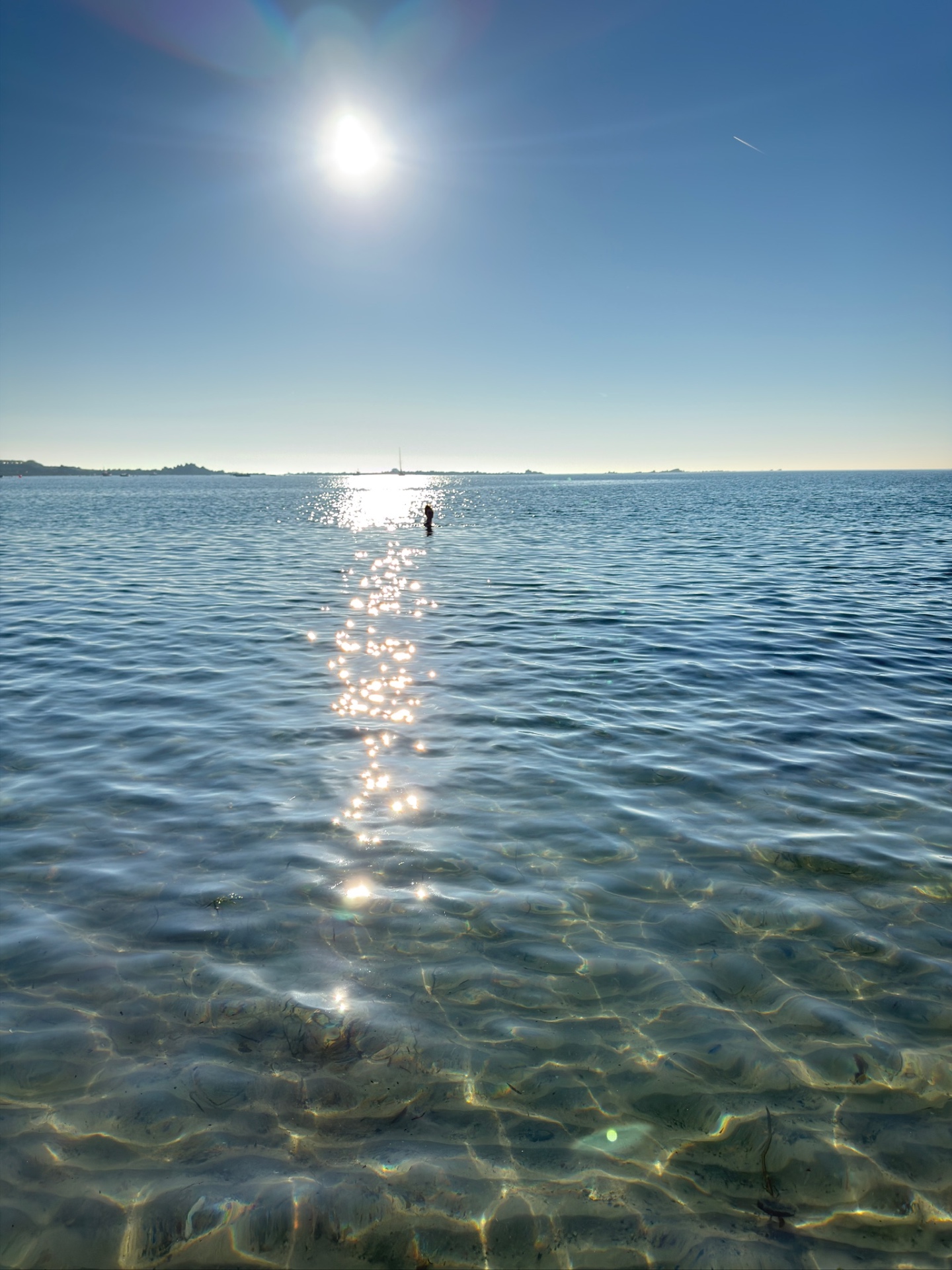 Sunlit sea, sparkling water off the Guernsey coast