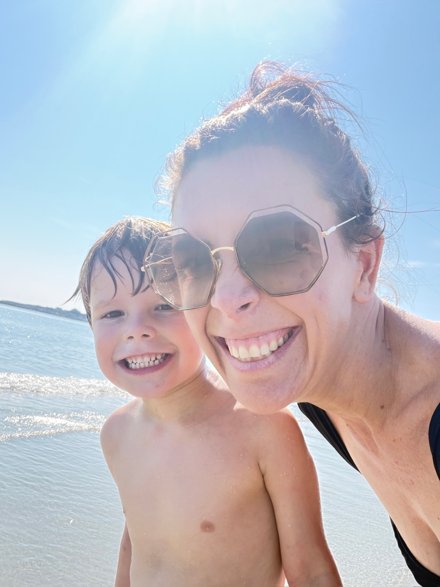 Ella and her son on the beach